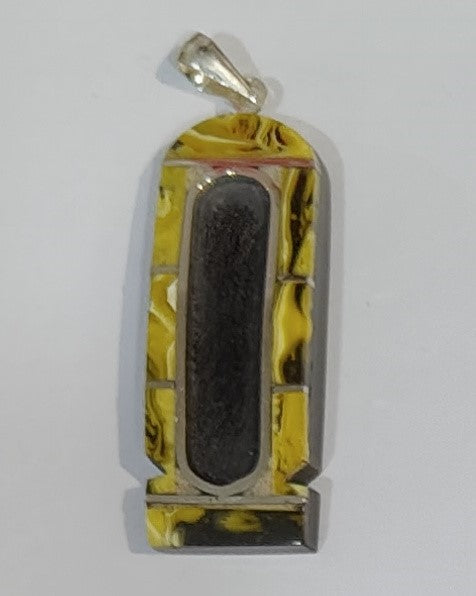 Ebony Cartouche Set in Amber – Ancient Legacy, Modern Craftsmanship